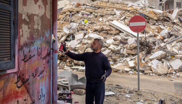 2026-04-06T142441Z_119108493_RC2MJKATMNLS_RTRMADP_3_IRAN-CRISIS-LEBANON-ISRAEL-TYRE-GRAFFITI.jpg
